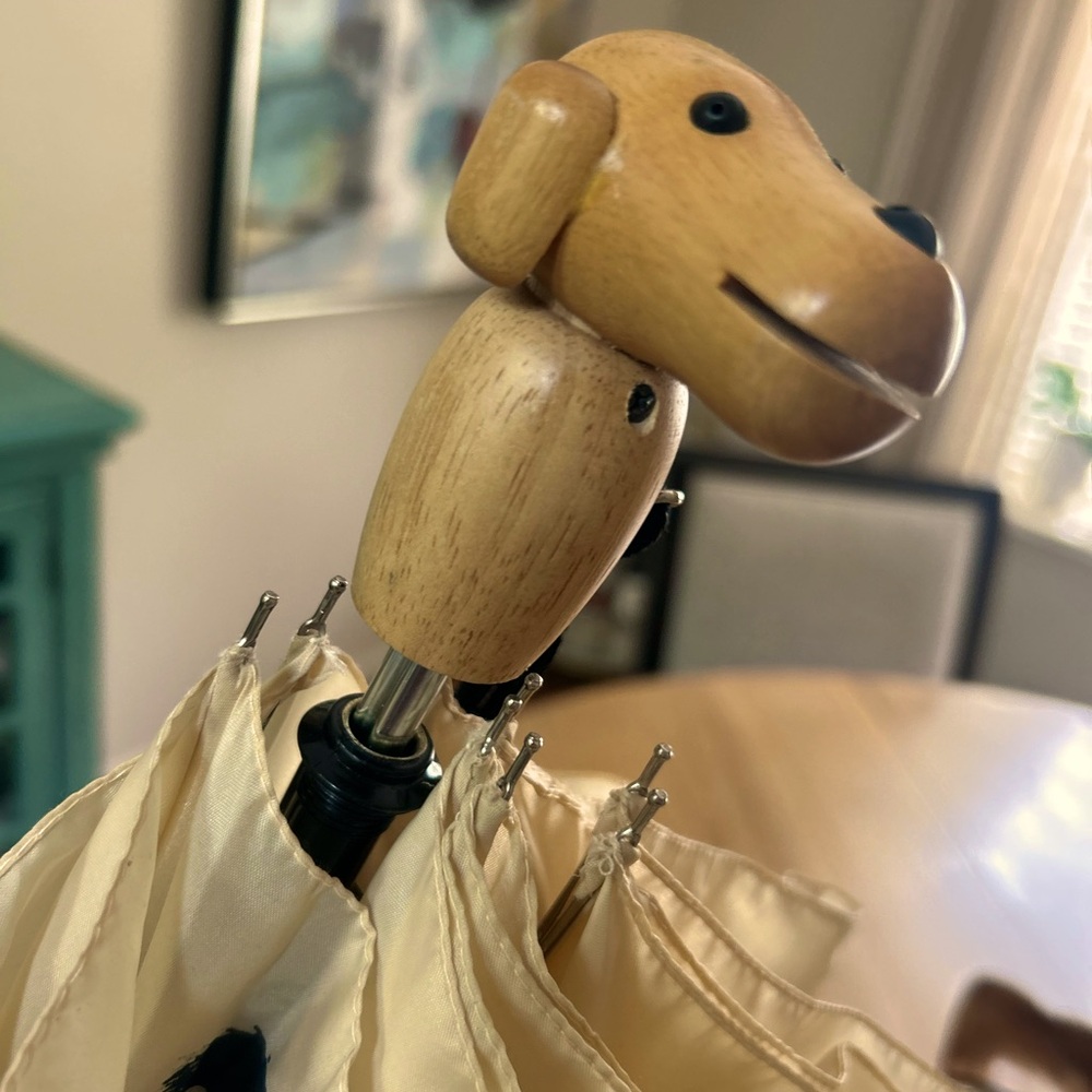 Wooden Dog Handle Cream Umbrella with adorable dogs all around the top !
